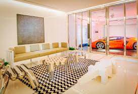 The garage apartment gets a luxury makeover homeowners are building spaces above the garage for guests, relatives and renters, complete with hardwood floors and marble countertops. 25 Of The Most Baller Garages On Earth Garage Design Garage Design Interior Luxury Garage