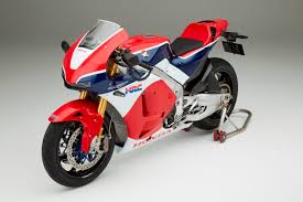 Motogp grid switches from four to three bikes per row while the 250cc and 125cc classes retain four bikes per row. In Detail Honda S Road Legal Motogp Bike