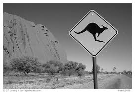 Kangaroo Crossing Sign Near Ayers Rock Australia Black And White Animals Black And White Australia Travel Beautiful Places Australian Animals