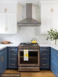 Eclectic kitchen with blue cabinets and yellow tile backsplash [design: Two Tone Kitchen Cabinets To Inspire Your Next Redesign