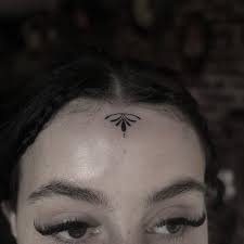 Image result for forehead tattoo