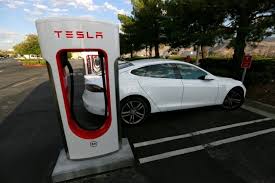 Tesla is 4.5 miles south of sutton. Tesla Begins Selling Cars In Dubai