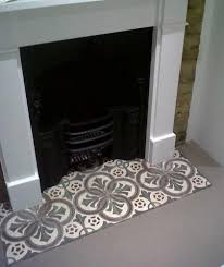 Gas fireplaces gas fires are popular for fireplaces with traditional cast iron arched or tiles inserts because they give a very realistic live flame without the mess and hassle of having a real fir… Fireplace Hearth Tiles Ideas Reclaimed Tile Company Hearth Tiles Fireplace Tile Fireplace Hearth Tiles
