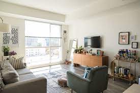 A Small And Stylish La Loft Features Smart Space Maximizing Tips Living Room Coffee Table Living Room Livingroom Layout