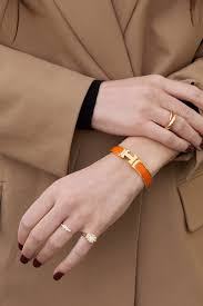 Hermes Narrow Clic H Bracelet (Orange/Yellow Gold Plated) - PM | Rent Hermes  jewelry for $49/month