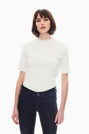 Maybe you would like to learn more about one of these? White Turtleneck T Shirt