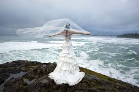 However, when she arrived she said the wedding party was in good spirits, joking and laughing about their bad luck. Winter Storm Watching Wedding Style In Tofino Marnie Recker Photography Van Wedding Tips Wedding Bridesmaids Dresses Blue Professional Wedding Photographer