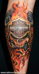 It starts with a classic skull backed by raging flames depicting danger and risk as the harley logo with the words etched on it appears on the back, sturdy and powerful creating a danger filled impact. Tattoos Ideas Designs And Photos Tattoos Ideas Harley Tattoos Harley Davidson Tattoos Biker Tattoos
