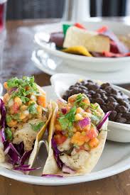Recipe includes homemade spice mix, sweet & spicy pineapple salsa with creamy cilantro avocado sauce. Doc Fords Rum Bar Grille On Twitter This Taco Tuesday We Are Featuring Our Campeche Fish Tacos Who Can T Get Enough Of Our Papaya Pico De Gallo As A Topper Docfords Sanibel Captiva Stpete