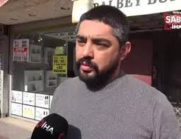 Binadan kopan beton parçanın altında kalmaktan saniyelerle kurtuldu