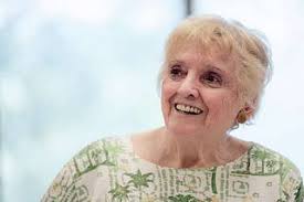 Retired local teacher Minette Moore has her cat Calico