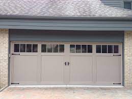 This window opens easily with a smooth control lever hardware system. 18 X 7 C H I Garage Door Model 5331 Color Sandstone Window Design Madison Carriage Hardware Garage Doors Garage Door Windows Garage Door Springs