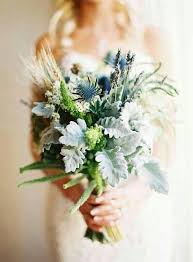After all, no matter what shade of blue a bride chooses, this hue will jump out against the pale white or ivory of a wedding gown.depending on the flowers and shades your florist uses, blue can communicate a variety of moods: Green Grey Blue Natural Wedding Flowers Bouquet Purple Wedding Bouquets Bridal Bouquet Blue Blue Wedding Flowers