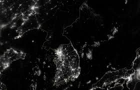 This night image of the korean peninsula shows that north korea is almost completely dark compared to neighboring south korea and china. North Korea Defends Blackout Satellite Photos The Essence Of Society Is Not On Flashy Lights The Verge