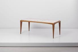 The suitcase coffee table is often an addition that comes about because you have an old trunk or different living rooms demand different styled trunk coffee tables and you can easily turn that dingy. Mosaic Coffee Table By Berthold Muller