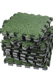 5 Most Popular Interlocking Carpet Tiles Reviewed With Pros And Cons From Findmats Com Grass Carpet Artificial Turf Interlocking Carpet Tile