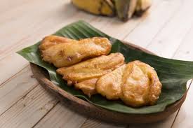 Pisang goreng ('fried banana' in indonesian/malay) is a fritter made by deep frying battered plantain in hot oil. Pisang Goreng Images Free Vectors Stock Photos Psd