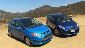 Toyota's radical, more efficient new prius meets volkswagen and ford hybrid rivals. 2013 Ford C Max Vs Toyota Prius V Hybrid Mashup Review Youtube