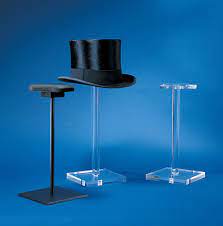 Helmet And Hat Stands Available At Artdisplay Com In Clear Or Black And 12 H Or 18 H Helmet Display Hat Displays Hat Stands Helmet Hat Display Stand