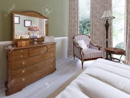 Defender security u 9945 cabinet lock secure important files and drawers, 1 1/8, diecast stainless steel, fits on 13/16 max panel thickness, pack of 1. Wooden Dresser With Mirror And Sliding Lockers In The Classic Stock Photo Picture And Royalty Free Image Image 113380844