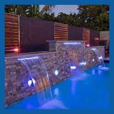 There is nothing like a swimming pool waterfall to take a backyard design to the next level. Spa Waterfall With Led Light Waterfall For Swimming Pool Indoor Artificial Waterfalls Swimming Pool Waterfall Spa Waterfall Pool Water Features