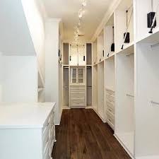 Har Closets Narrow Walk In Closet Walk In Wardrobe Narrow Walk In Wardrobe Track Lighting Custom Clo Narrow Closet Closet Designs Walk In Closet Design