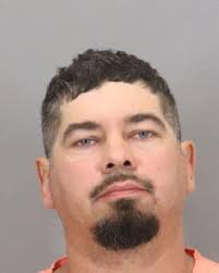 MAN CHARGED IN ATTEMPTED MURDER OF PRISON OFFICER DIES IN JAIL The suspect  who was charged with two counts of attempted murder, including