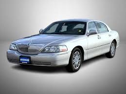 Image result for Light Ice Blue 2010 Town Car