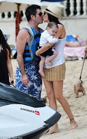 Simon Cowell And His Baby Mama Lauren Silverman With Their Baby Boy Eric Celebrity Babies Simon Cowell Mermaid Fashion