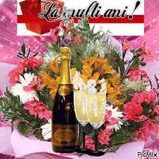 La multi ani cu drag si dor si iti uram o viata frumoasa si parfumata ca un buchet de trandafiri! La Multi Ani La Multi Ani Gif Merry Christmas And Happy New Year Happy Birthday