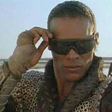 His name is Vincent Kyle he acted cyborg (1989) by the name of fender you  know him well right ?drop the heavy words by him from cyborg movie