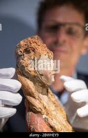 Nuremberg, Germany. 11th May, 2020. Oliver Mack, head of the Institute for  Art Technology and Conservation at the Germanisches Nationalmuseum and  chief restorer, points to the damage caused by woodworm to a sculpture of  the "Holy Virgin" (Cologne ...