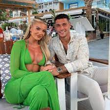 Love Island's Molly Smith wows in teeny bikini top as she cosies up to beau  