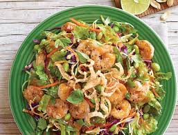 Add lettuce to a bowl and toss shrimp and vegetables over the top. Applebee S See You Tomorrow Thai Shrimp Salad Food Network Recipes Food Network Healthy
