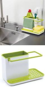 This versatile sink caddy extends from the front to the back of your sink and has a small container as well. Kitchen Soap And Sponge Holder Space Saving Kitchen Kitchen Sink Caddy Cool Kitchens