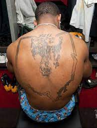 Was looking through an old thread and someone mentioned anthony smith's collection of generic tattoos. Anthony Smith Tattoo On Back