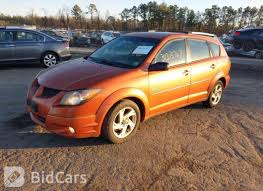 Image result for Sunburst Orange 2004 Pontiac