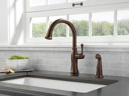 Choose from traditional, contemporary, and transitional faucets that come in a variety of finishes, shapes, and sizes. Delta Cassidy Single Handle Kitchen Faucet With Spray Champagne Bronze Walmart Com Walmart Com