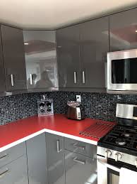 Beautiful Kitchen With Glossy Grey Cabinets And Red Counter Top Grey Kitchens Glossy Kitchen Black And Grey Kitchen
