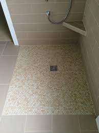 All curbs have a slope back into the shower area and the shower area has a 1/4 per foot slope towards the drain. 5 Reasons To Use A One Level Wet Room Shower Vs A Shower Base With A Curb