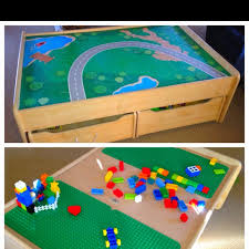 A crane lifts and lowers cargo onto the train and a helicopter soars over the town with blades spinning. Pin By Dorothy Gottfredson On Doro Getting Crafty Train Table Diy Table Top Craft Activities For Kids