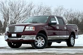 Image result for Dark Toreador Red 2006 Lincoln
