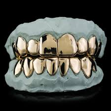 The only golden part is actually the crown. Shop At Custom Gold Grillz The 1 Store For Gold Teeth Online