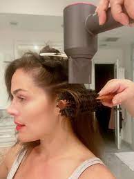 Use a brush, comb, or your fingers to pull your hair closer to the blow dryer if necessary. How To Give Yourself Blowout At Home Expert Tips Allure