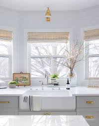 The bay window itself is a beautiful window style, adding interest and optimizing the light by having three planes open even with the small amount of space available. Kitchen Sink Bay Windows Design Ideas