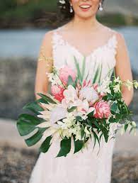Maybe you would like to learn more about one of these? Tropical Bridal Bouquet With King Protea Ginger Orchids Monstera Leaf Tropical Bridal Bouquet Tropical Wedding Flowers Tropical Flowers Bouquet