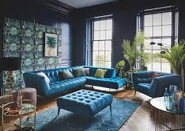 The living room is full of green glam vibes, thanks to the statement sofa (which reminds us of benjamin moore palm coast teal) that's paired wood accents and a mix of patterned chairs keeps the space from looking too plain or monochromatic. 10 Teal Living Room Ideas 2021 The Color Effect