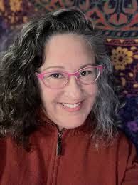 The British artist Damien Hirst created 10,000 NFTs of physical paintings.  Then he gave buyers a choice: take the painting and lose the NFT, or keep  the NFT and watch the painting