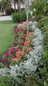 Spring Flower Garden In Our Front Yard In The Villages Fl Organic Gardening Magazine Spring Garden Flowers Plants