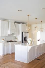white kitchen remodel with gold accents